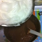 whites into chocolate yolk mixture