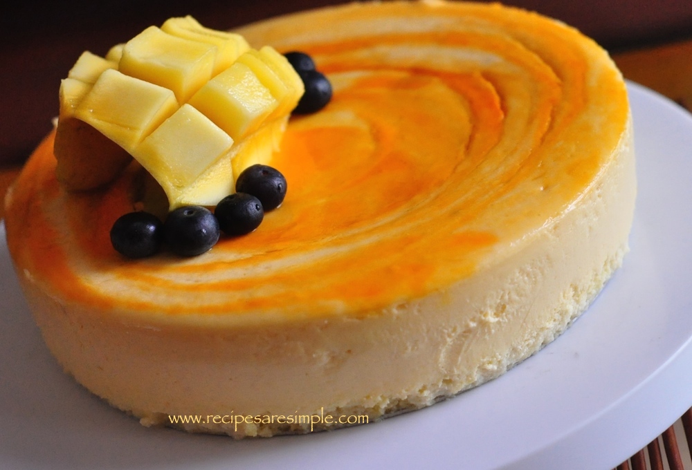 mango cheesecake with sponge base