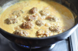 meatballs simmered in sauce for Spaghetti and Meatballs