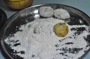 home made chicken nuggets - coat in flour