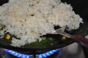 add rice and fry for green chili fried rice