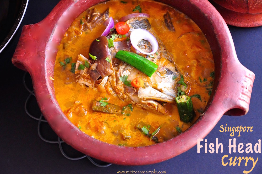 Singapore fish head curry in a clay pot