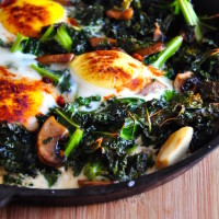 baked eggs and kale with mushroom 200x200 Breads and Breakfast
