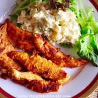 smoky grilled chicken tenders with potato salad meal