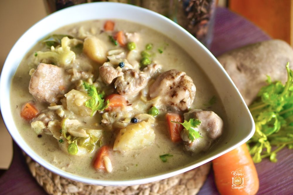 a bowl containing chicken stew